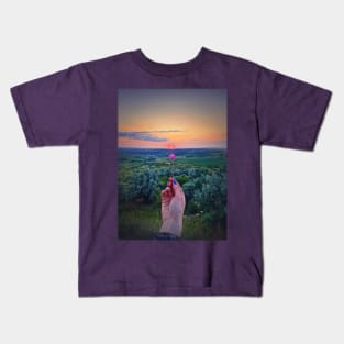 woman hand holding a gentle purple flower Kids T-Shirt